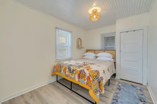 Walk to the beach or Sunset Lake with a front yard and Pet-Friendly!