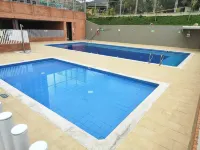 Apt in Giron, 3 blocks from the main park and 15 minutes from the airport! Hoteles en 