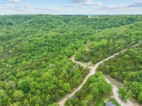 Branson Tiny Home on 52 Acres w/ Private Stocked Pond 1/4 mile hike from home!