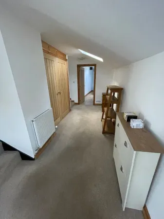 Lovely 3 bed flat above village restaurant Отели в г. Уигтон