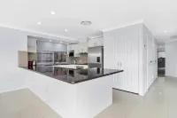 Relaxing Waterfront Oasis with Heated Spa!