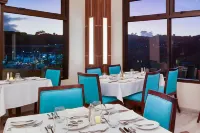 託巴哥的舒適酒店客房和套房 - 早餐