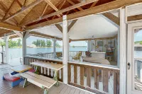 Relaxing Lakeside Retreat With Boathouse, Dock, Deck, Firepit and Screened Porch - 4-Star