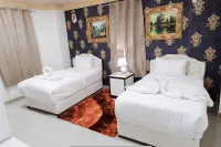 Capital O 141 Golden Rays Hotel Hotels in 