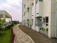 Warm and Homey 1Br Apartment at Atlanta Residences by Travelio Hotel di Kecamatan Beji