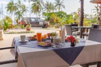 Hotel Oasis de Kiamu - servizio colazione