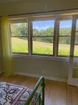 Surrounded by quiet fields and woods