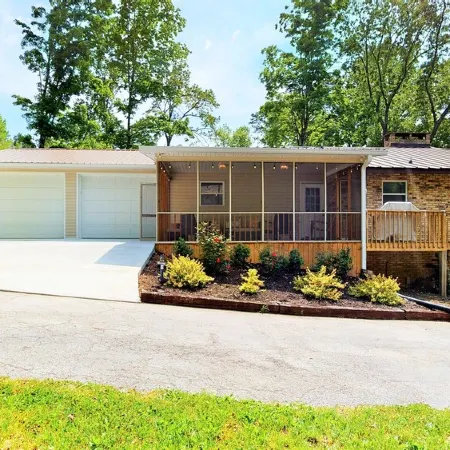 Lake Front house on Watts Bar Lake with large private dock, 2 screen porches