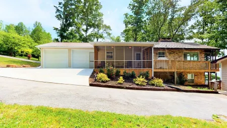 Lake Front house on Watts Bar Lake with large private dock, 2 screen porches