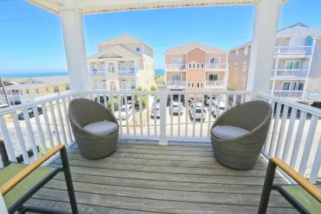 Luxury 4 bedroom townhome with ocean view steps away from the beach!