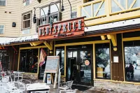 Architectural marvel w/firepit, hot tub, prime location, lounge & bar rooms!