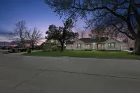 Home adjacent to Country Club, near Hospitals, Park, College and shopping.