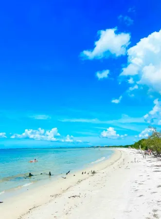 Florida Beach Hideaway – Steps from the Sand! • Pool • Fast WiFi • Free Parking