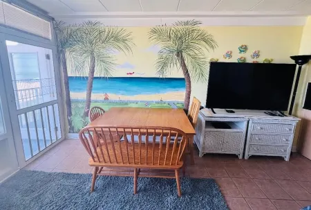 VB Oceanfront Condo at Boardwalk. See Dolphins from Balcony. Steps to Beach+Pool