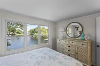 Stunning waterfront home with big yard & dock! Voted #1 rental in all of RI!