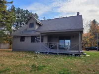 Waterfront house w/ large garage located on trail 8 in Grand Marais.