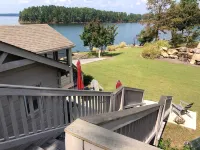 Cozy Lakefront Log cabin with miles of view plus small beach!