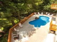 Sandbridge water lovers retreat with beach, pool, canal, and lakes to explore. Hotels near شاطئ ساندبريدج