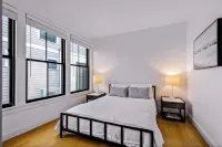 🏳️‍🌈 Modern 2-Bedroom East End Condo 🚗 2 Car Parking 😎 Steps from the Beach