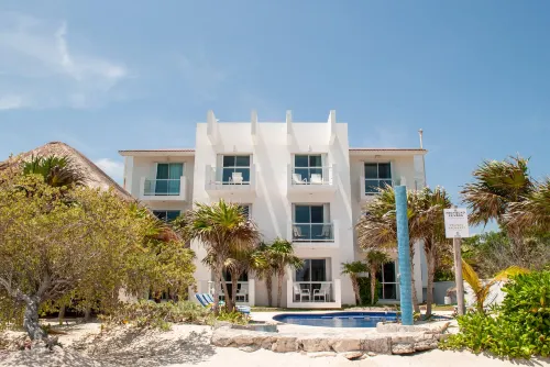 Tan Ik Beachfront Condos Отели в г. Акумаль