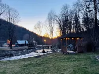 Charming 1940s Cottage Updated-Creek Front-Fire Pit Hotels in Mitchell County
