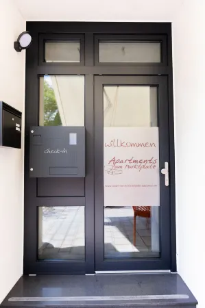 Apartments am Marktplatz Отели в г. Мюнзинген