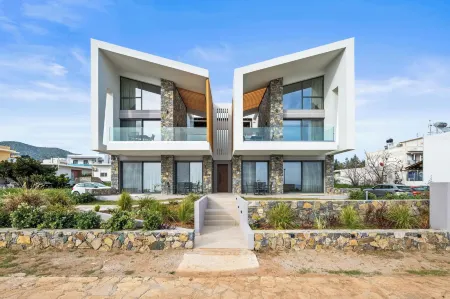 Evelmare Beachfront Apartments Отели в г. Makris Gialos