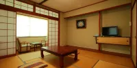 Family Ryokan Kawakyu with Showa Retro, Private Hot Spring - Triple Room In Japanse Stijl Met Gedeelde Badkamer