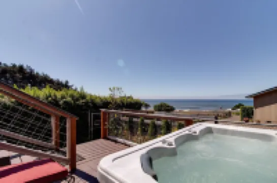 Large beach home with fantastic views of the Oregon Coast with a quaint cabin.