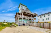 Towering beach house with private pool, hot tub, decks & ocean views