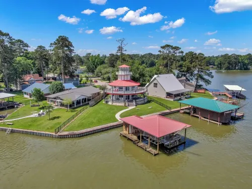 Waterfront Lighthouse with Large Dock for a Great Family Getaway