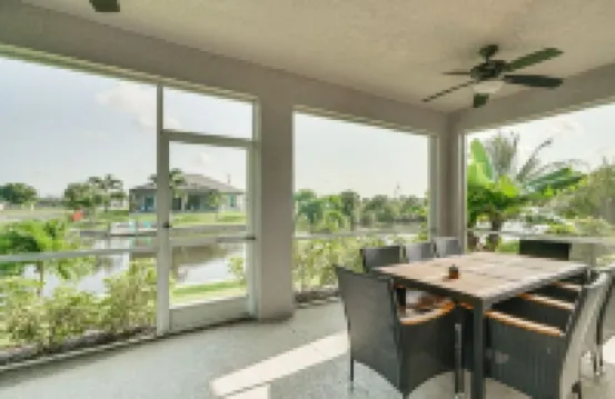Sunroom and Serene Canal View - Bright Spacious Retreat