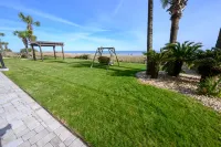 Ocean View and Beachfront Pool Access - Elegant Coastal Retreat