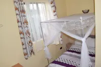 Reconfort Villa Guest House Отели в г. 