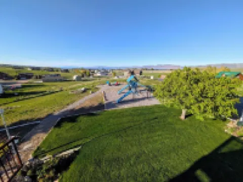 Golf Course Lakehouse with fantastic views of the lake, mountains & golf course.