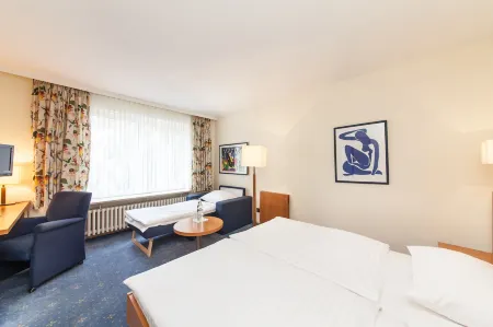 Hotel Drei Kronen Elmshorn Отели в г. Кольмар