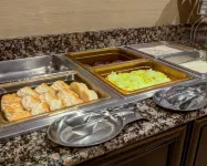Charlotte Suites by IHG - servizio colazione