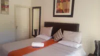Ikaze Guest House - parking