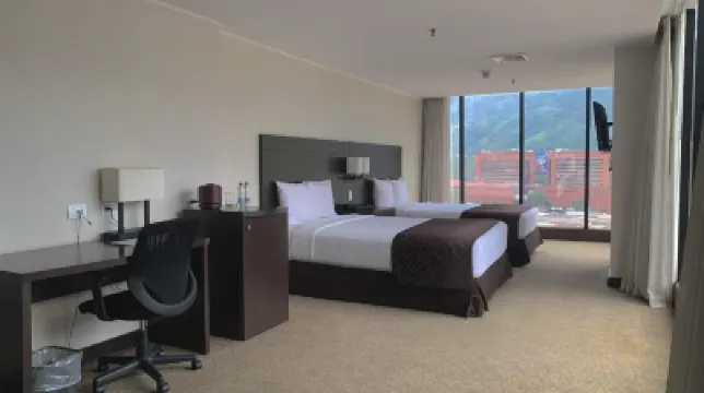 查考套房酒店 酒店