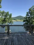 Colorful lakeside home with beautiful views and dock access