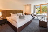 Huber's Boutique Hotel Hôtels à : Finkenberg