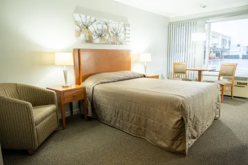 Hôtel Motel le Voyageur Отели в г. Босвиль