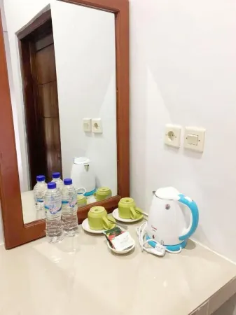 Charlitoz Homestay Отели в г. Wae Kelambu