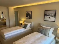 Vacation home Allgäu: eat-in kitchen, fireplace, 4 bedrooms, 3 bathrooms, terrace & hot tub