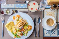 Triple Crown Resort - Desayuno