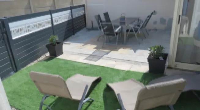 House near beach, port and shops, quiet area, private parking and courtyard.