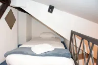 Steep-Climb Attic Studio w Floor Heating 55'' TV, Washer & Dryer Hotels in Maksimir