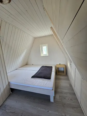 Enjoy a vacation close to the Baltic Sea in a Finnhütte directly on the Saaler Bodden.