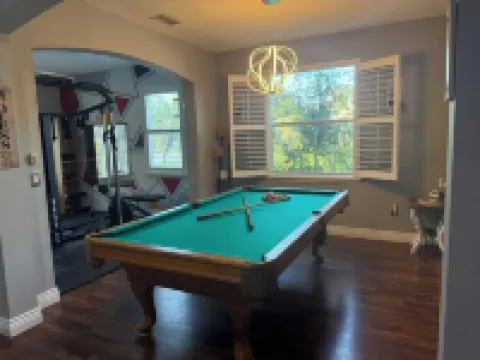 Relax in my calm and stylish space. Enjoy the relaxing lakeview and heated pool.