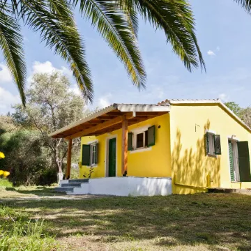 Cute Yellow Handmade House with Garden